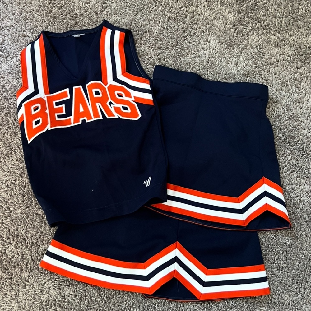 Authentic cheer uniform fits size 7/8